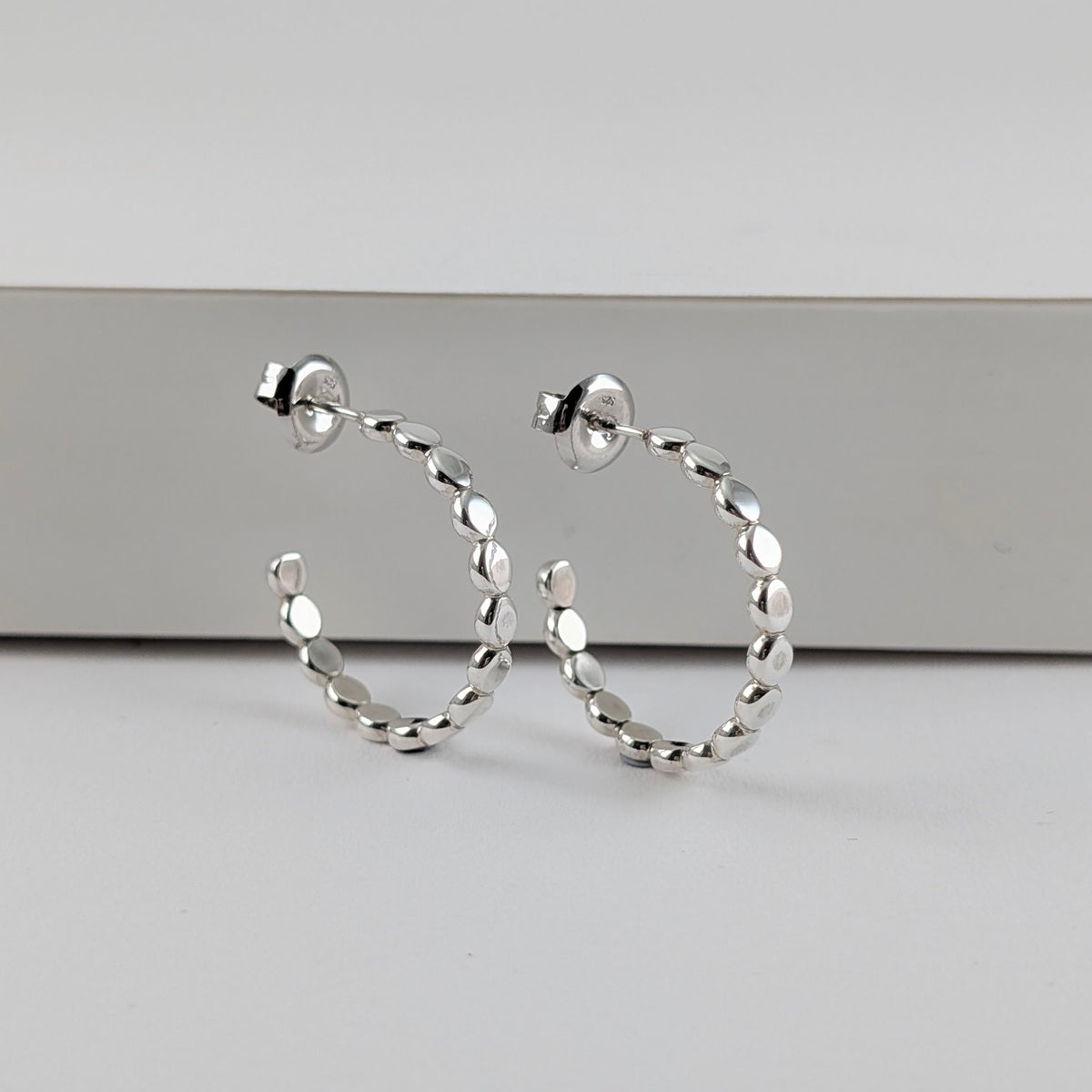 Rolled beaded wire sterling silver hoop earrings