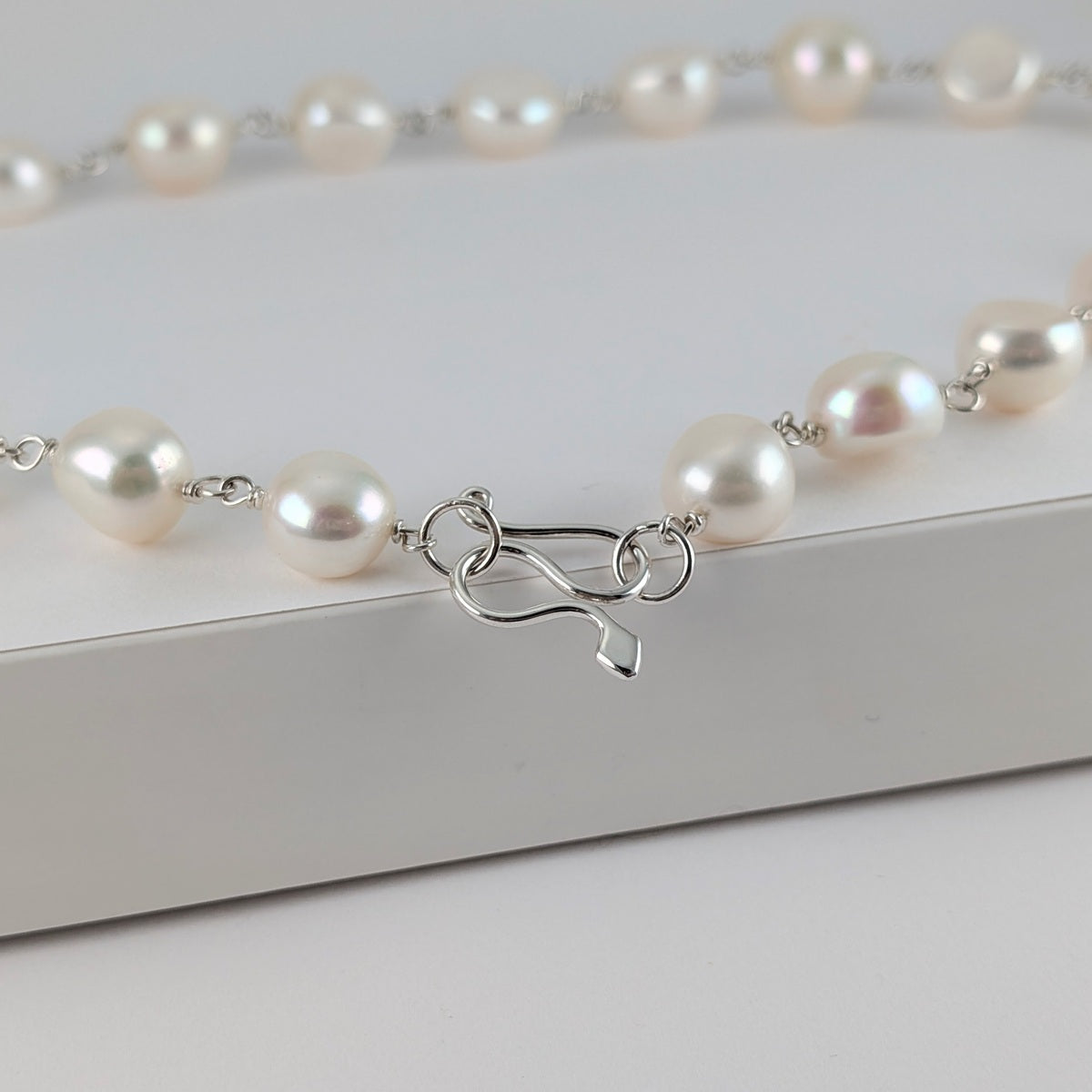 Large white button freshwater pearl necklace with sterling silver snake catch