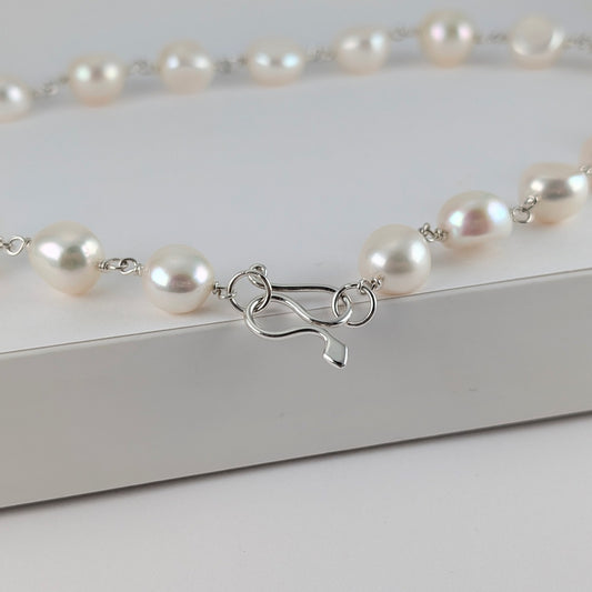 Large white button freshwater pearl necklace with sterling silver snake catch