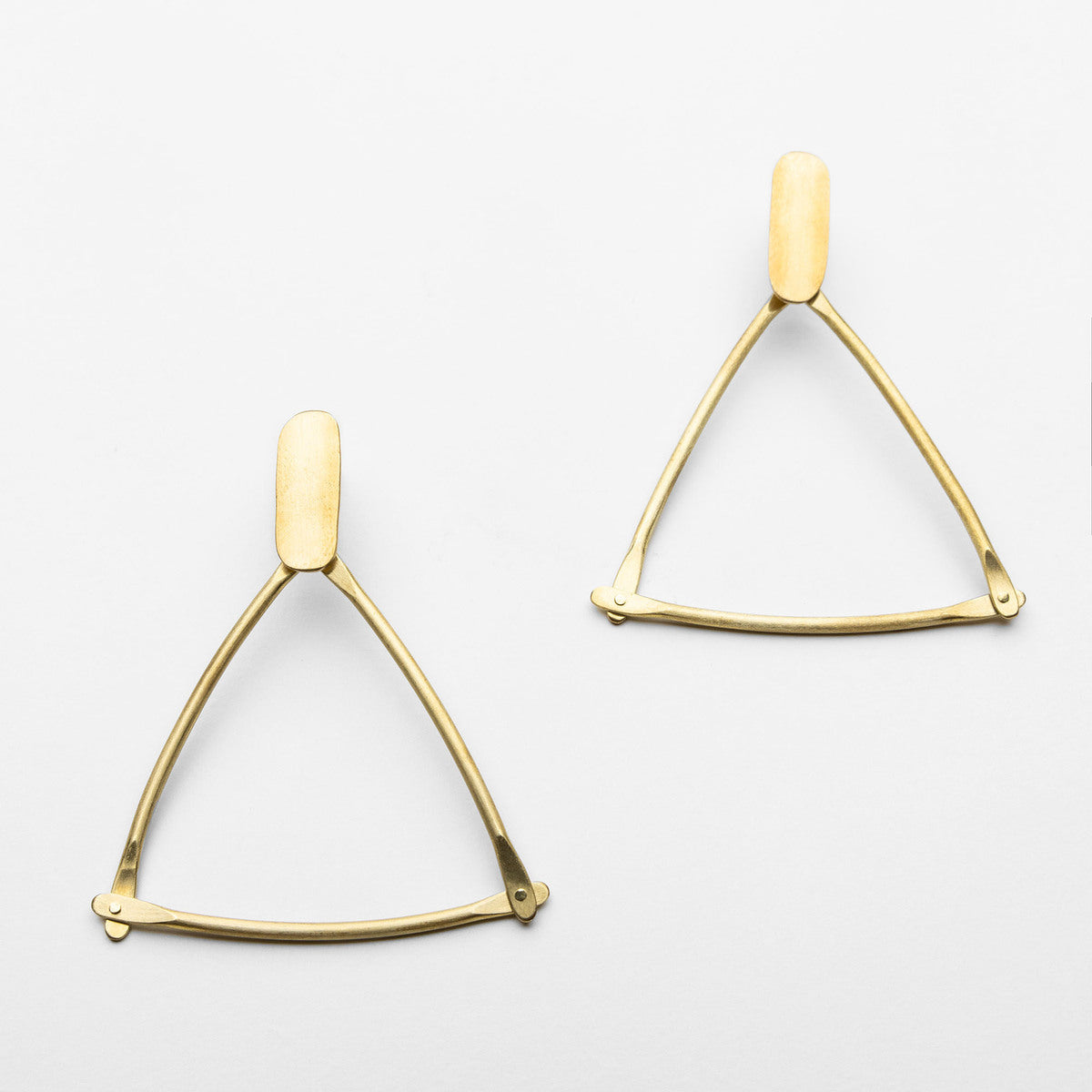 Brass triangles