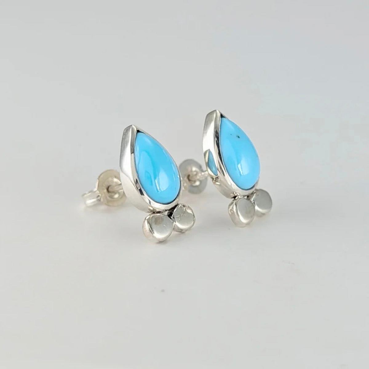 Small sleeping beauty turquoise stud earrings