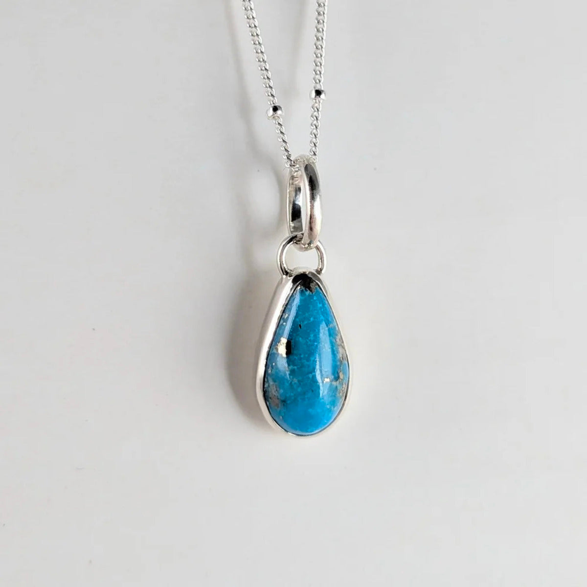 Satellite chain necklace with small teardrop Persian turquoise pendant